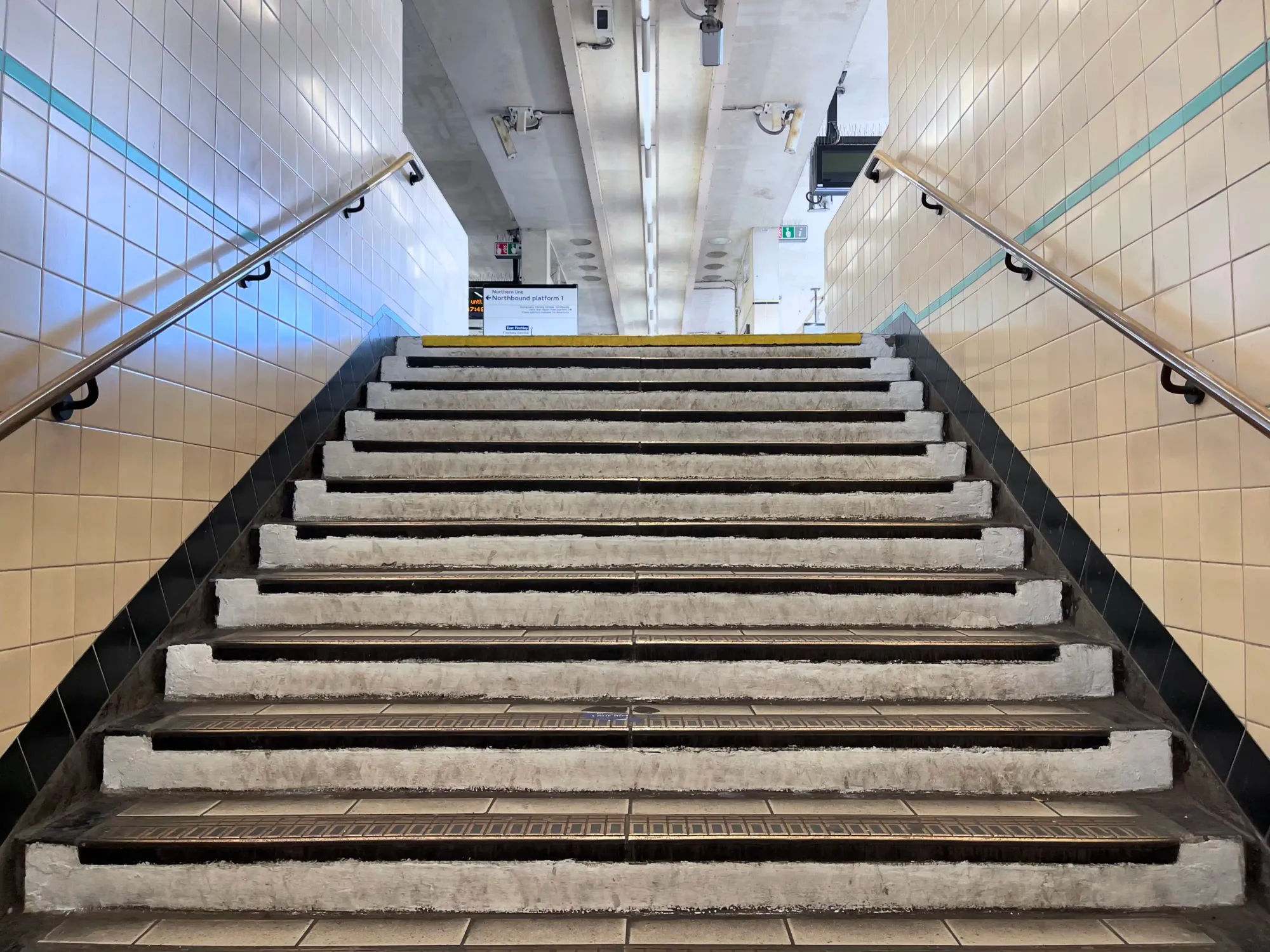 Looking up the stairs to the island platform level