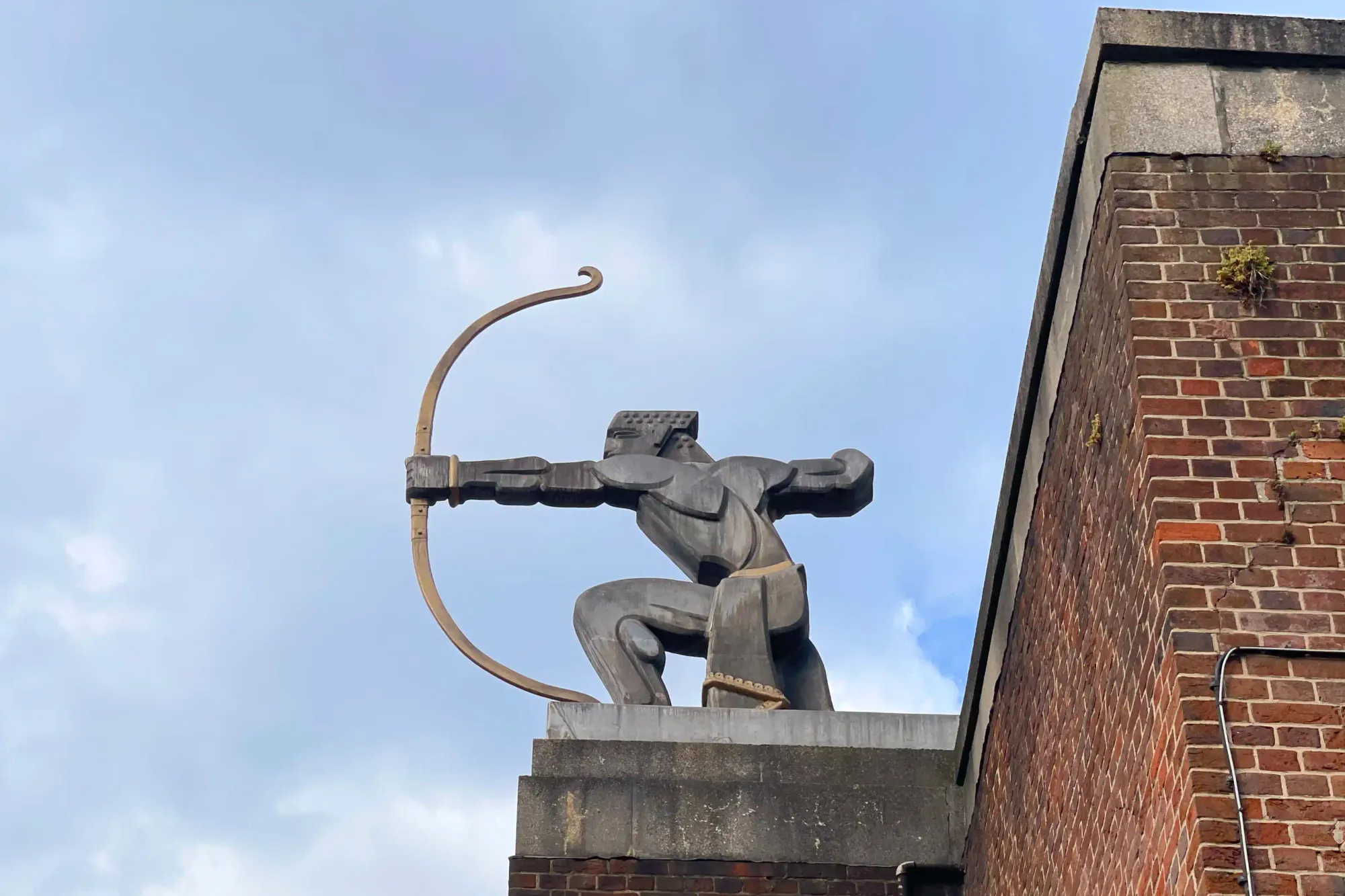 Close-up of The Archer sculpture at East Finchley station