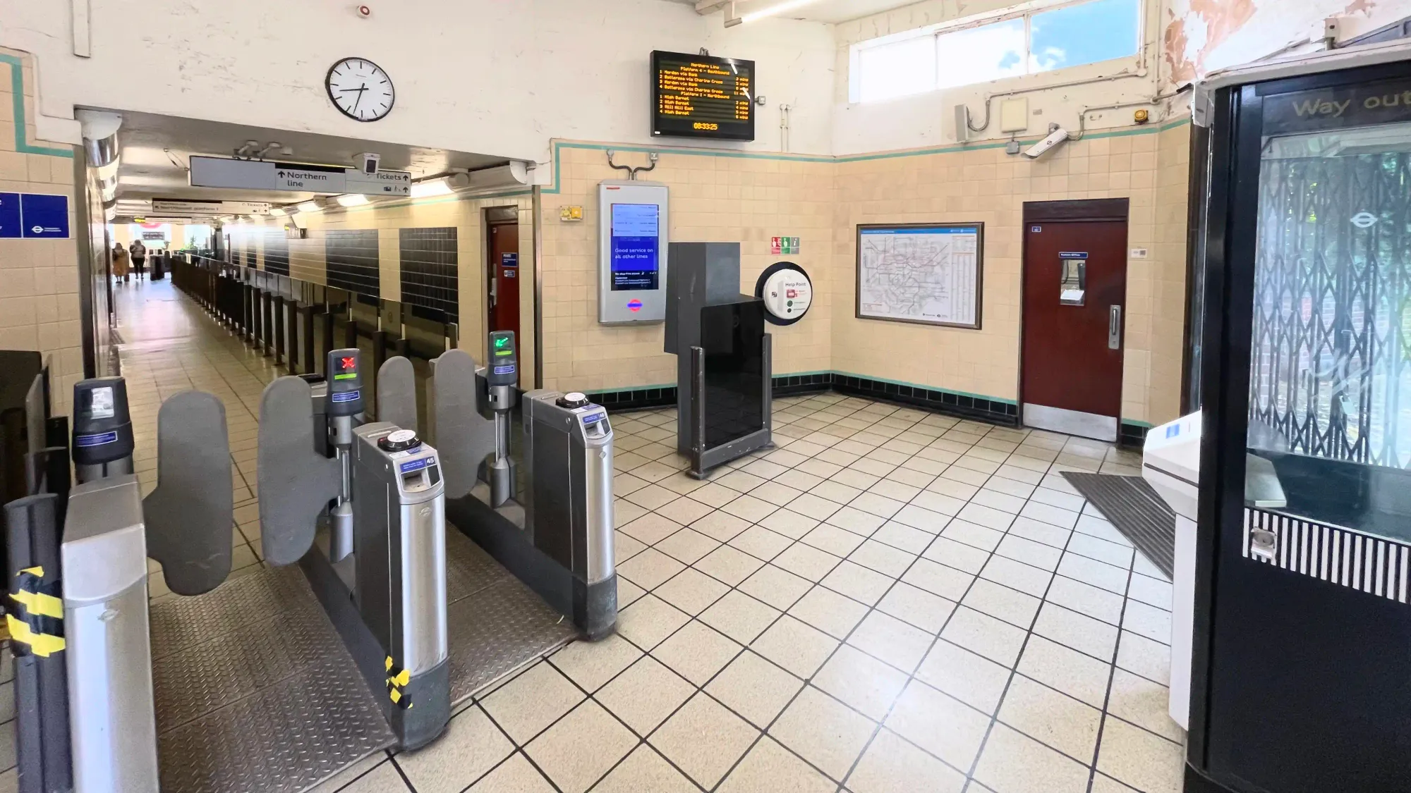 Looking along the underground subway from the ticket gates at the station’s rear entrance