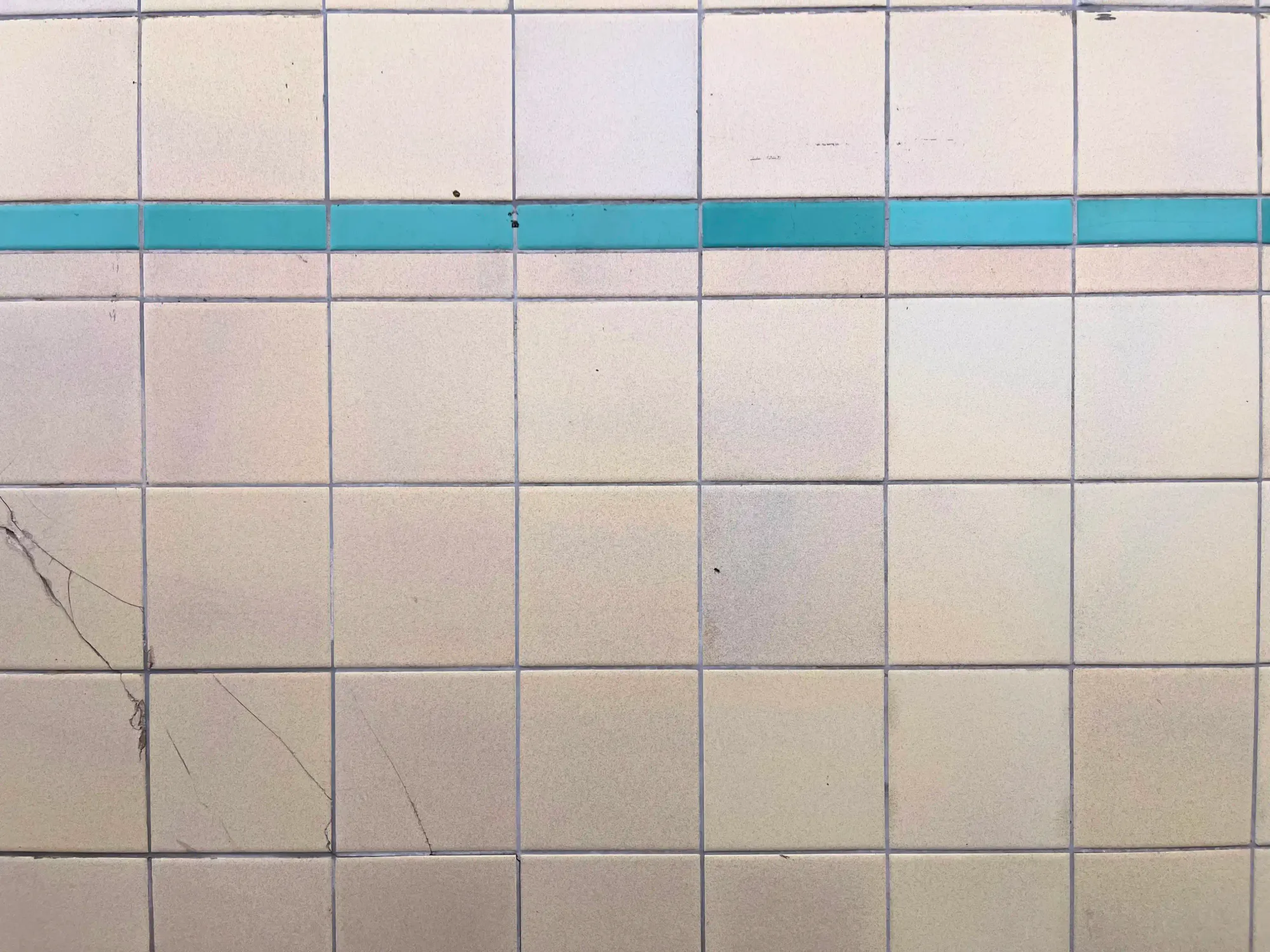 East Finchley shares same tiling colour scheme with neighbouring Highgate - other Holden stations replace teal green for other colours