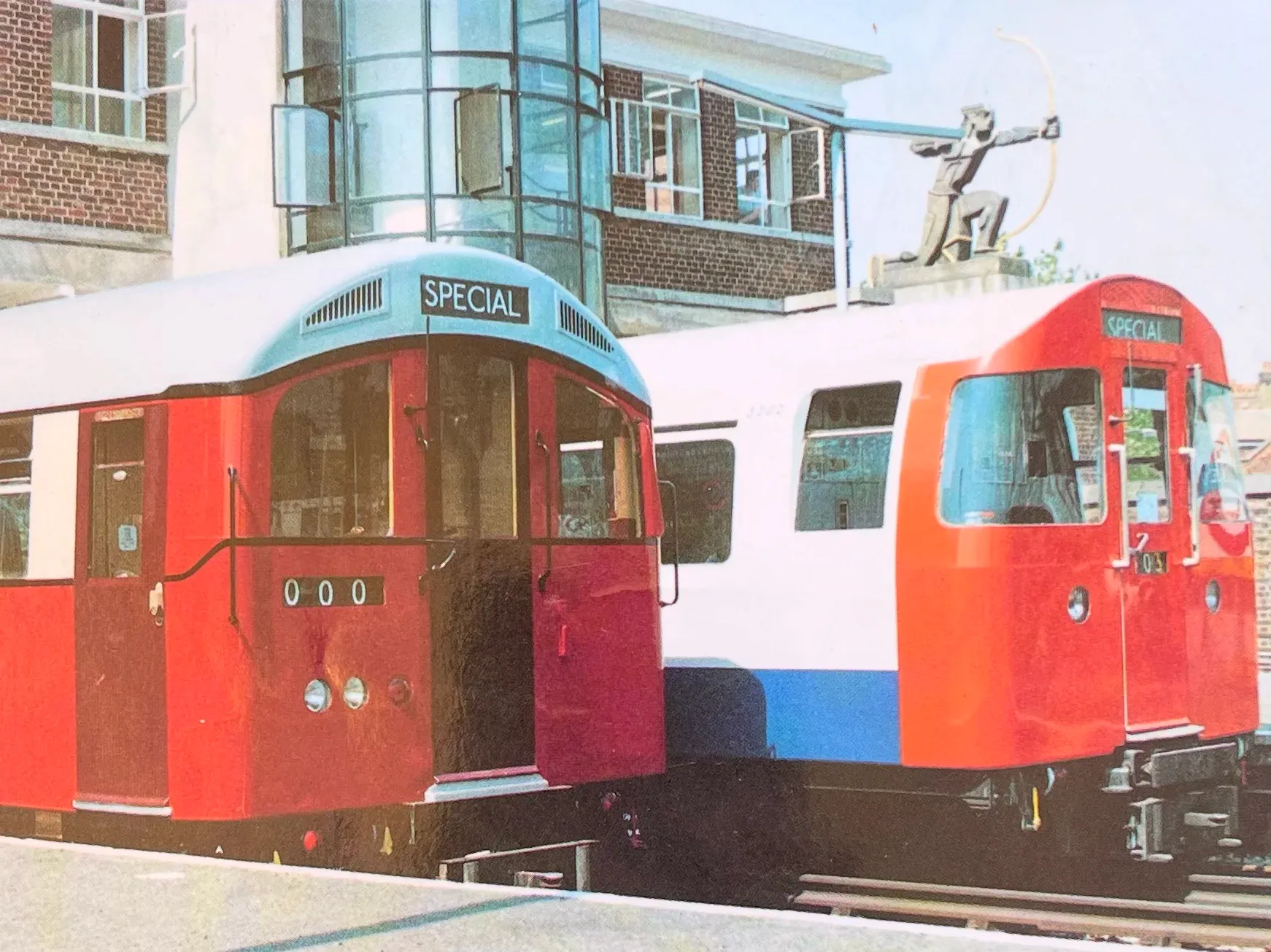 Cover of Tube Centenary 1990 souvenir brochure showing two classic Tube trains in central platforms
