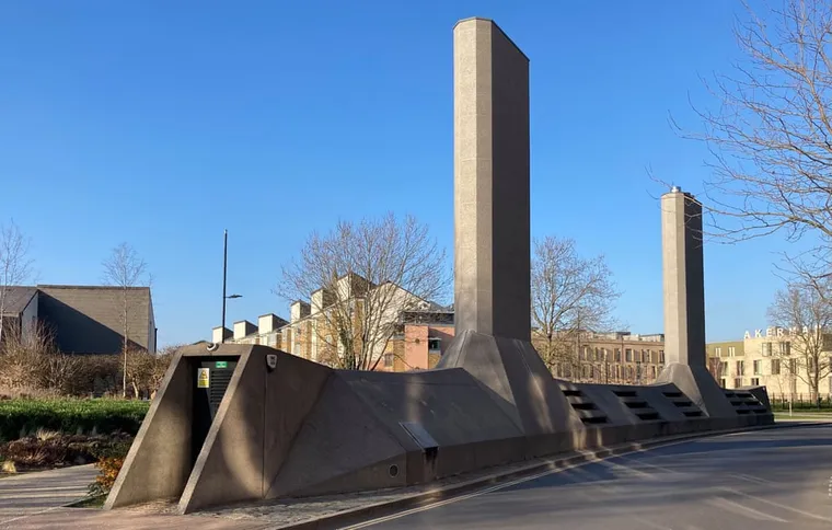Photo of the concrete Camberwell subway vent, looking like a submarine, with a tall stack as the sail. Judy Ovens