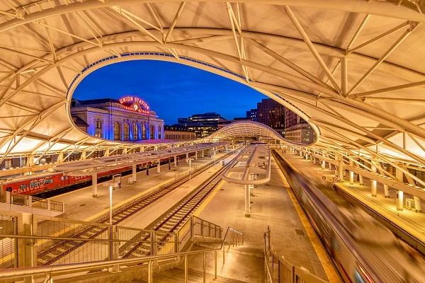 Classical Denver Union Station with swooping modern LRT canopy in front