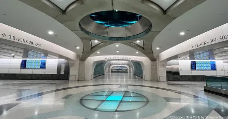 Beautiful new Grand Central Madison Terminal underground concourse with curved arches & artwork