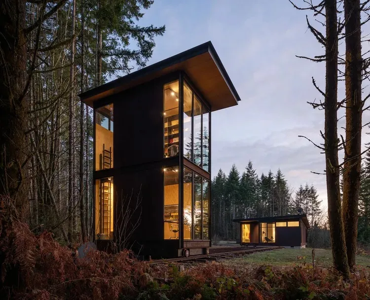 Two storey home office in the woods is on tracks to detach from main house for privacy Treehugger