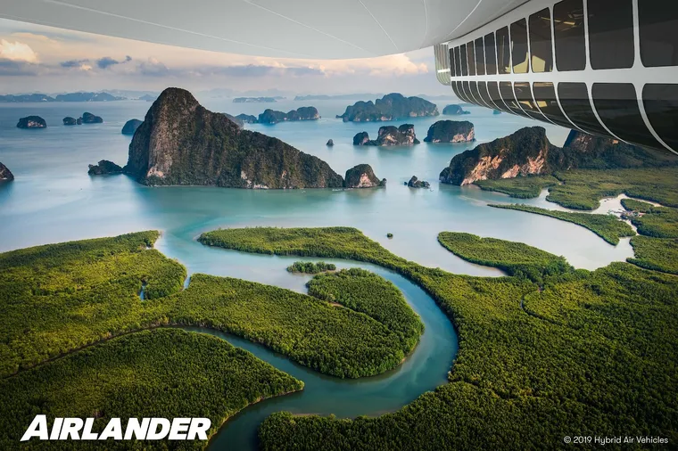Airlander 10 airship with panaramic windows flying over scenic islands render. HAV