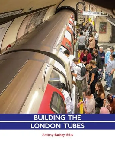 Cover of book 'Building The London Tubes', with photo of crowded Tube station platform.