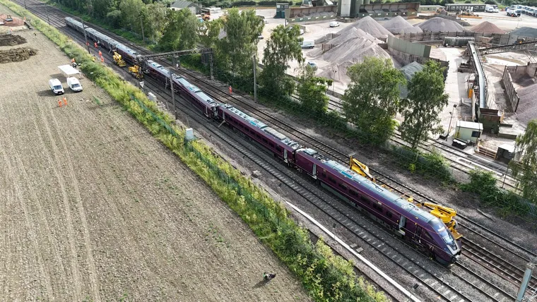 Bedford accident site showing 2 trains, the one that collided with the stopped one with a crushed now and slightly derailed. RAIB