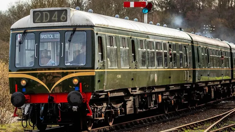 Forest green West Midlands heritage train for commuters. BBC